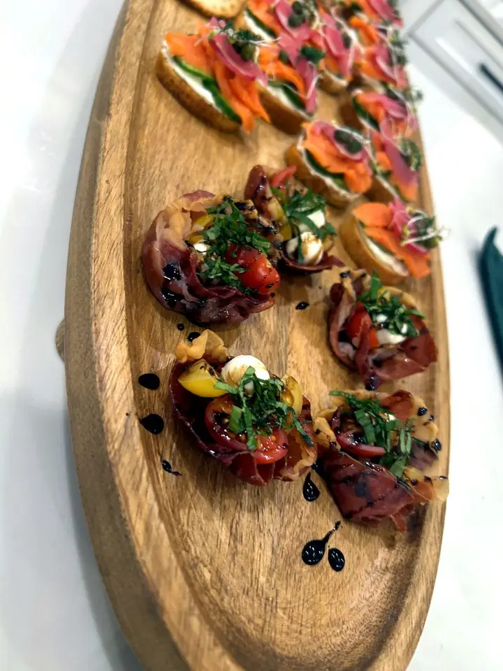 Seasonal crostini board with whipped ricotta and herbs